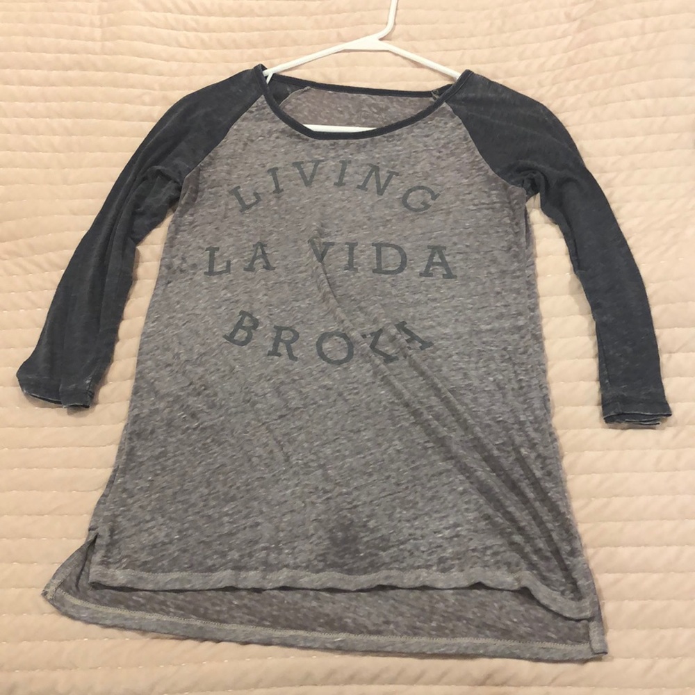 Baseball styled shirt.